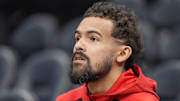 Mar 18, 2025; Charlotte, North Carolina, USA; Atlanta Hawks guard Trae Young (11) just before the start of the first quarter against the Charlotte Hornets at Spectrum Center