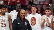 Florida State Seminoles head coach Leonard Hamilton is surrounded by current and former players honoring him during his final home game before retirement. The Florida State Seminoles defeated the Southern Methodist Mustangs 76-69 on Saturday, March 8, 2025.