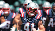 Sep 14, 2025; Miami Gardens, Florida, USA; New England Patriots safety Brenden Schooler (41) enters the field before the game against the Miami Dolphins at Hard Rock Stadium. Mandatory Credit: Sam Navarro-Imagn Images