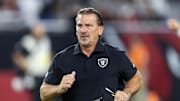 Aug 23, 2025; Glendale, Arizona, USA; Las Vegas Raiders quarterbacks coach Greg Olson against the Arizona Cardinals during a preseason NFL game at State Farm Stadium. Mandatory Credit: Mark J. Rebilas-Imagn Images