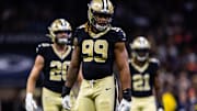Aug 23, 2025; New Orleans, Louisiana, USA; New Orleans Saints defensive end Chase Young (99) looks on against the Denver Broncos during the first half at Caesars Superdome. Mandatory Credit: Stephen Lew-Imagn Images