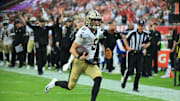 Dec 7, 2025; Tampa, Florida, USA; New Orleans Saints quarterback Tyler Shough (6) runs for a touchdown during the fourth quarter against the Tampa Bay Buccaneers at Raymond James Stadium. Mandatory Credit: Kim Klement Neitzel-Imagn Images