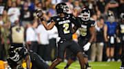 Aug 29, 2024; Boulder, Colorado, USA; Colorado Buffaloes quarterback Shedeur Sanders (2) prepares to pass the ball in the second half against the North Dakota State Bison at Folsom Field. Mandatory Credit: Ron Chenoy-Imagn Images