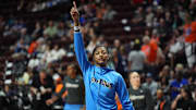 Angel Reese warms up before the Sky's game against the Sun.