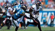 Jacksonville Jaguars wide receiver Travis Hunter (12) tackles Houston Texans wide receiver Nico Collins (12) during the fourth quarter of an NFL football matchup at EverBank Stadium, Sunday, Sept. 21, 2025, in Jacksonville, Fla. The Jaguars defeated the Texans 17-10. [Corey Perrine/Florida Times-Union]