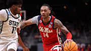 Mar 28, 2025; Atlanta, GA, USA; Mississippi Rebels guard Dre Davis (14) dribbles against Michigan State Spartans guard Jase Richardson (11) in the first half of a South Regional semifinal of the 2025 NCAA tournament at State Farm Arena. Mandatory Credit: Brett Davis-Imagn Images