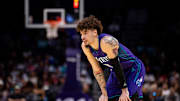 Mar 1, 2025; Charlotte, North Carolina, USA; Charlotte Hornets guard LaMelo Ball (1) looks on during a free throw in the fourth quarter against the Washington Wizards at Spectrum Center. Mandatory Credit: Scott Kinser-Imagn Images