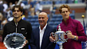 Sep 8, 2024; Flushing, NY, USA; Jannik Sinner (ITA) and Taylor Fritz (USA) pose for a photo alongside tennis legend Andre Agassi after the men’s singles final of the 2024 U.S. Open tennis tournament at USTA Billie Jean King National Tennis Center.