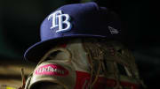 Apr 3, 2023; Washington, District of Columbia, USA; A general view of a Tampa Bay Rays hat and glove during the seventh inning of the game against the Washington Nationals at Nationals Park.