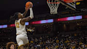 Nov 9, 2025; Columbia, Missouri, USA; Missouri Tigers guard Sebastian Mack (12) jumps for a shot against the VMI Keydets at Mizzou Arena.