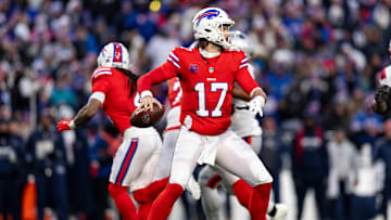 Buffalo Bills quarterback Josh Allen sets to throw against the New England Patriots