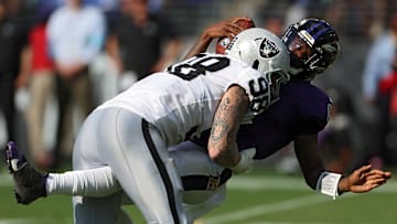 Las Vegas Raiders #98, Defensive End, Maxx Crosby sacks Baltimore Ravens # 8, Quarterback, Lamar Jackson in Raiders 26-23 Week 2 Victory in 2024. 
