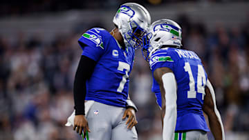 Geno Smith and DK Metcalf of the Seattle Seahawks