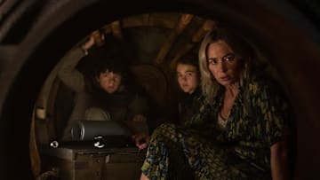 L-r, Marcus (Noah Jupe), Regan (Millicent Simmonds), and Evelyn (Emily Blunt) brave the unknown in "A Quiet Place Part II."