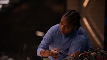 Dominique Thorne as Riri Williams in Marvel Studios' BLACK PANTHER: WAKANDA FOREVER. Photo by Eli Adé. © 2022 MARVEL.