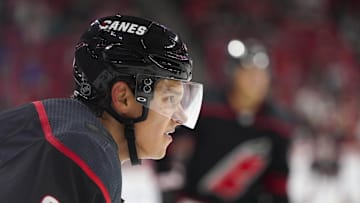Oct 7, 2018; Raleigh, NC, USA;  Carolina Hurricanes right wing Sebastian Aho (20) looks on during  the game against the New York Rangers at PNC Arena. The Carolina Hurricanes defeated the New York Rangers 8-5. Mandatory Credit: James Guillory-Imagn Images