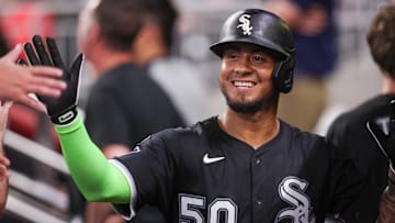 Aug 18, 2025; Atlanta, Georgia, USA; Chicago White Sox first baseman Lenyn Sosa (50) celebrates with teammates after a three-run home run against the Atlanta Braves in the sixth inning at Truist Park. Mandatory Credit: Brett Davis-Imagn Images
