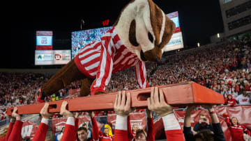 Bucky Badger does push-ups after a Wisconsin touchdown during the second quarter of their game.