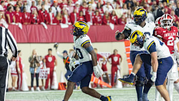 Nov 9, 2024; Bloomington, Indiana, USA;Michigan Wolverines running back Kalel Mullings (20) celebrates his touchdown in the second half against the Indiana Hoosiers  at Memorial Stadium. Mandatory Credit: Trevor Ruszkowski-Imagn Images