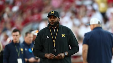 Sep 6, 2025; Norman, Oklahoma, USA; Michigan Wolverines head coach Sherrone Moore stands on the sideline prior to a game against the Oklahoma Sooners at Gaylord Family-Oklahoma Memorial Stadium. Mandatory Credit: Kevin Jairaj-Imagn Images