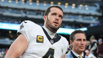 Dec 8, 2024; East Rutherford, New Jersey, USA; New Orleans Saints quarterback Derek Carr (4) walks off the field after field after an injury during the fourth quarter at MetLife Stadium. Mandatory Credit: Vincent Carchietta-Imagn Images