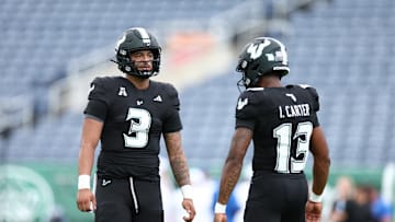 The Bulls blew out Tulsa Saturday and everyone got in on the 63-30 win., Backup quarterback Izzy Carter (13) threw two touchdowns as USF became  bowl eligible. 
