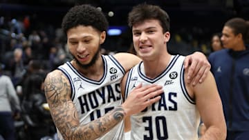Dec 2, 2024; Washington, District of Columbia, USA; Georgetown Hoyas guard Kayvaun Mulready (45) and Georgetown Hoyas guard Michael Van Raaphorst (30) celebrate after a game against the UMBC Retrievers at Capital One Arena. Mandatory Credit: Daniel Kucin Jr.-Imagn Images