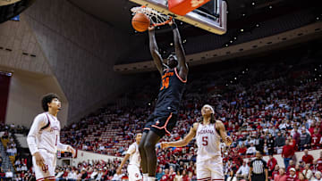 Dec 3, 2024; Bloomington, Indiana, USA; Sam Houston State Bearkats forward Kalifa Sakho (34) shoots the ball while Indiana Hoosiers forward Malik Reneau (5) defends in the second half at Simon Skjodt Assembly Hall. Mandatory Credit: Trevor Ruszkowski-Imagn Images