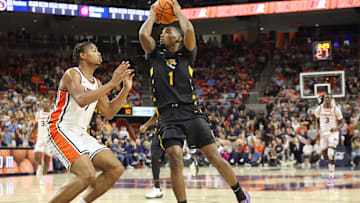  Bethune-Cookman Wildcats guard Arterio Morris (1) shoots over Auburn Tigers guard Keyshawn Hall (7) 