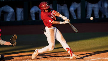 Feb 25, 2025; Tuscaloosa, AL, USA; Alabama hitter Justin Lebron hits a three-run homer against Jacksonville State at Sewell-Thomas Stadium.