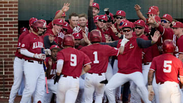 Feb 25, 2025; Tuscaloosa, AL, USA; Alabama players celerate with Justin Lebron after he hit a three-run homer against Jacksonville State at Sewell-Thomas Stadium.