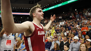 Mar 8, 2025; Auburn, Alabama, USA; Alabama Crimson Tide forward Grant Nelson (4) celebrates after the Crimson Tide beat the Auburn Tigers in overtime at Neville Arena. Mandatory Credit: John Reed-Imagn Images
