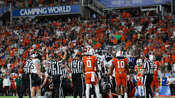 Dec 28, 2024; Orlando, FL, USA; Iowa State Cyclones quarterback Rocco Becht (3) scores a touchdown against the Miami Hurricanes in the fourth quarter during the Pop Tarts bowl at Camping World Stadium. Mandatory Credit: Nathan Ray Seebeck-Imagn Images