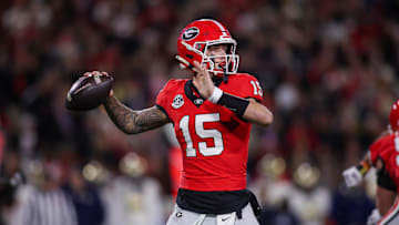 Nov 29, 2024; Athens, Georgia, USA; Georgia Bulldogs quarterback Carson Beck (15) throws a pass against the Georgia Tech Yellow Jackets in the first quarter at Sanford Stadium. Mandatory Credit: Brett Davis-Imagn Images
