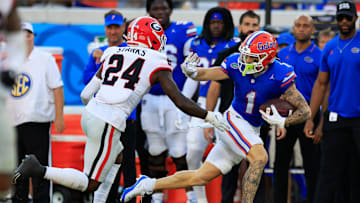 Florida Gators wide receiver Ricky Pearsall (1) is pressured out of bounds by Georgia Bulldogs defensive back Malaki Starks (24) during the third quarter of an NCAA football game Saturday, Oct. 28, 2023 at EverBank Stadium in Jacksonville, Fla. Georgia defeated Florida 43-20. [Corey Perrine/Florida Times-Union]