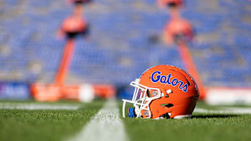 Nov 23, 2024; Gainesville, Florida, USA; A Florida Gators helmet sits on the field before a game against the Mississippi Rebels at Ben Hill Griffin Stadium. Mandatory Credit: Matt Pendleton-Imagn Images