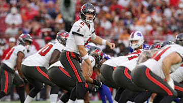 Aug 23, 2025; Tampa, Florida, USA; Tampa Bay Buccaneers quarterback Kyle Trask (2) calls a play at the line against the Buffalo Bills in the first quarter at Raymond James Stadium. Mandatory Credit: Nathan Ray Seebeck-Imagn Images