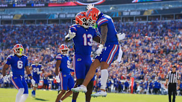 Florida Gators wide receiver Eugene Wilson III (3) celebrate his touchdown with running back Jadan Baugh (13) during the first quarter of an NCAA football game, Saturday, Nov. 1, 2025, at EverBank Stadium in Jacksonville, Fla. [Corey Perrine/Florida Times-Union]