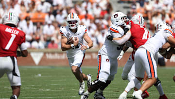 Sep 13, 2025; Auburn, Alabama, USA;  Auburn Tigers quarterback Jackson Arnold (11) carries against the South Alabama Jaguars during the third quarter at Jordan-Hare Stadium. Mandatory Credit: John Reed-Imagn Images
