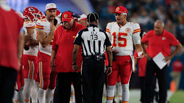 Kansas City Chiefs quarterback Patrick Mahomes (15) talks with down judge Patrick Turner (13) as head coach Andy Reid and tight end Travis Kelce (87) are on the sideline during the second quarter of a preseason NFL football game Saturday, Aug. 10, 2024 at EverBank Stadium in Jacksonville, Fla. [Corey Perrine/Florida Times-Union]