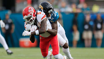 Jacksonville Jaguars cornerback Montaric Brown (30) tackles Kansas City Chiefs wide receiver Hollywood Brown (5) during the first quarter of a preseason NFL football game Saturday, Aug. 10, 2024 at EverBank Stadium in Jacksonville, Fla. [Corey Perrine/Florida Times-Union]