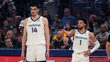 Jan 4, 2025; San Francisco, California, USA;  Memphis Grizzlies center Zach Edey (14) and guard Scotty Pippen Jr. (1) talk before a substitution in the first quarter against the Golden State Warriors at Chase Center. Mandatory Credit: David Gonzales-Imagn Images