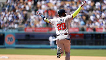 May 5, 2024; Los Angeles, California, USA;  Atlanta Braves designated hitter Marcell Ozuna (20) reacts after hitting a home run during the seventh inning against the Los Angeles Dodgers at Dodger Stadium. Mandatory Credit: Kiyoshi Mio-Imagn Images