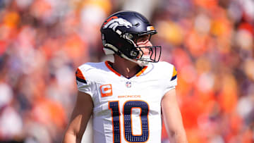 Sep 15, 2024; Denver, Colorado, USA; Denver Broncos quarterback Bo Nix (10) during the first quarter against the Pittsburgh Steelers at Empower Field at Mile High. Mandatory Credit: Ron Chenoy-Imagn Images