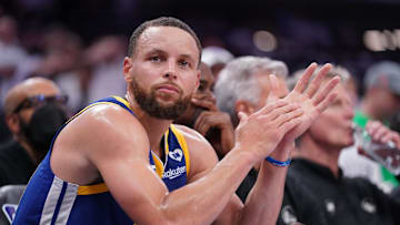 Apr 16, 2024; Sacramento, California, USA; Golden State Warriors guard Stephen Curry (30) sits on the bench during action against the Sacramento Kings in the fourth quarter during a play-in game of the 2024 NBA playoffs at the Golden 1 Center. Mandatory Credit: Cary Edmondson-Imagn Images