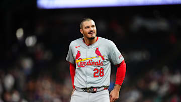 Sep 25, 2024; Denver, Colorado, USA; St. Louis Cardinals third base Nolan Arenado (28) reacts in the fourth inning against the Colorado Rockies at Coors Field. Mandatory Credit: Ron Chenoy-Imagn Images