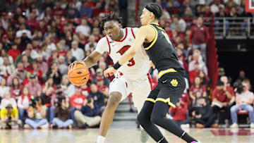 Feb 22, 2025; Fayetteville, Arkansas, USA; Arkansas Razorbacks forward Adou Thiero (3) drives against Missouri Tigers guard Trent Pierce (11) during the first half at Bud Walton Arena. Mandatory Credit: Nelson Chenault-Imagn Images