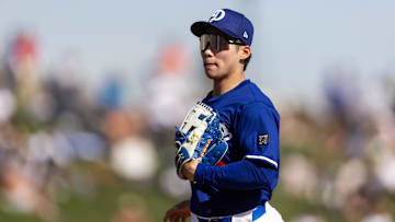 Feb 20, 2025; Phoenix, Arizona, USA; Los Angeles Dodgers second baseman Hyeseong Kim against the Chicago Cubs during a spring training game at Camelback Ranch-Glendale. Mandatory Credit: Mark J. Rebilas-Imagn Images
