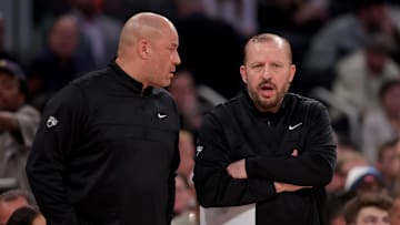 Feb 1, 2025; New York, New York, USA; New York Knicks assistant coach Rick Brunson (left) talks to head coach Tom Thibodeau during the second quarter against the Los Angeles Lakers at Madison Square Garden. Mandatory Credit: Brad Penner-Imagn Images
