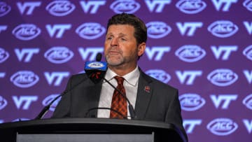 Jul 23, 2024; Charlotte, NC, USA; Virginia Tech head coach Brent Pry answers questions from the media during the ACC Kickoff at Hilton Charlotte Uptown. Mandatory Credit: Jim Dedmon-USA TODAY Sports